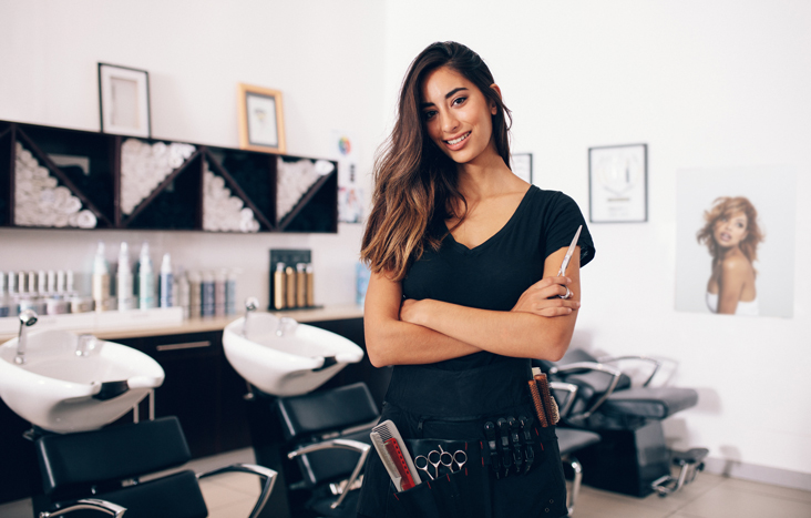 woman hair stylist in salon