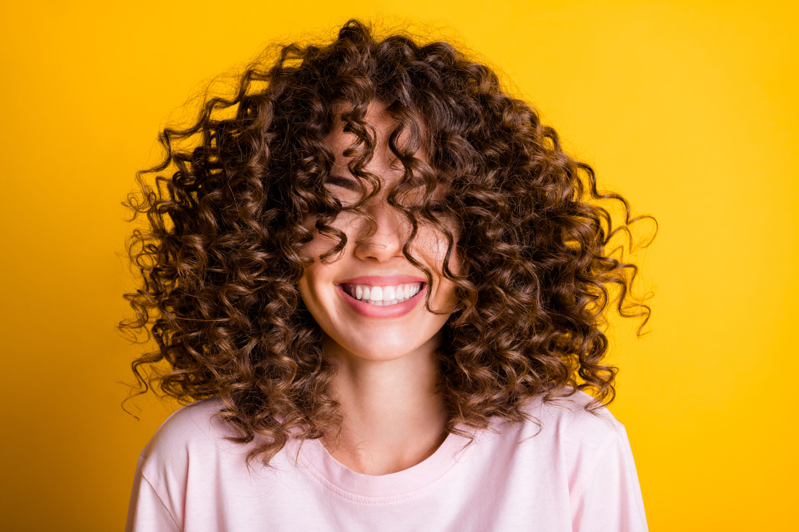 women with curly bangs