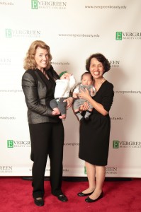 CEO Rhoda Olsen with Thi Trieu, founder of Evergreen Beauty College with her grand babies at graduation
