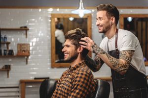 male stylist working with a client