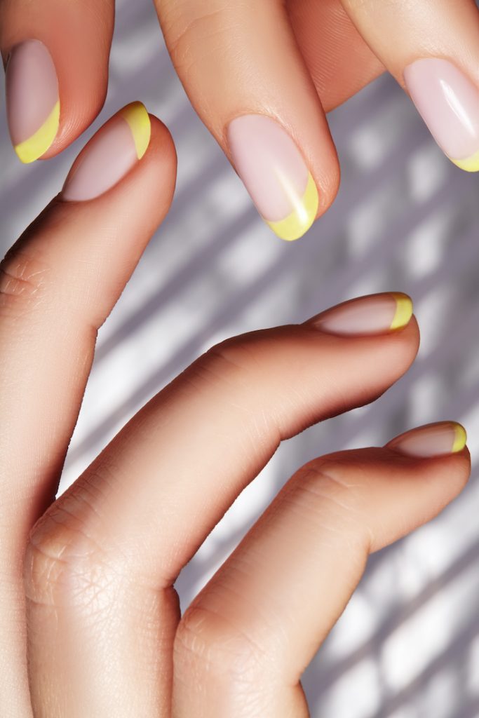 yellow french manicure