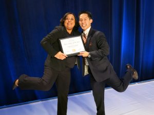 Camalita Glover & Joe Trieu at the International Salon & Spa Expo receiving the award