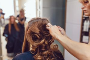 hair designer doing updo