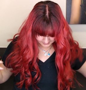 Red curly hair with shadow root