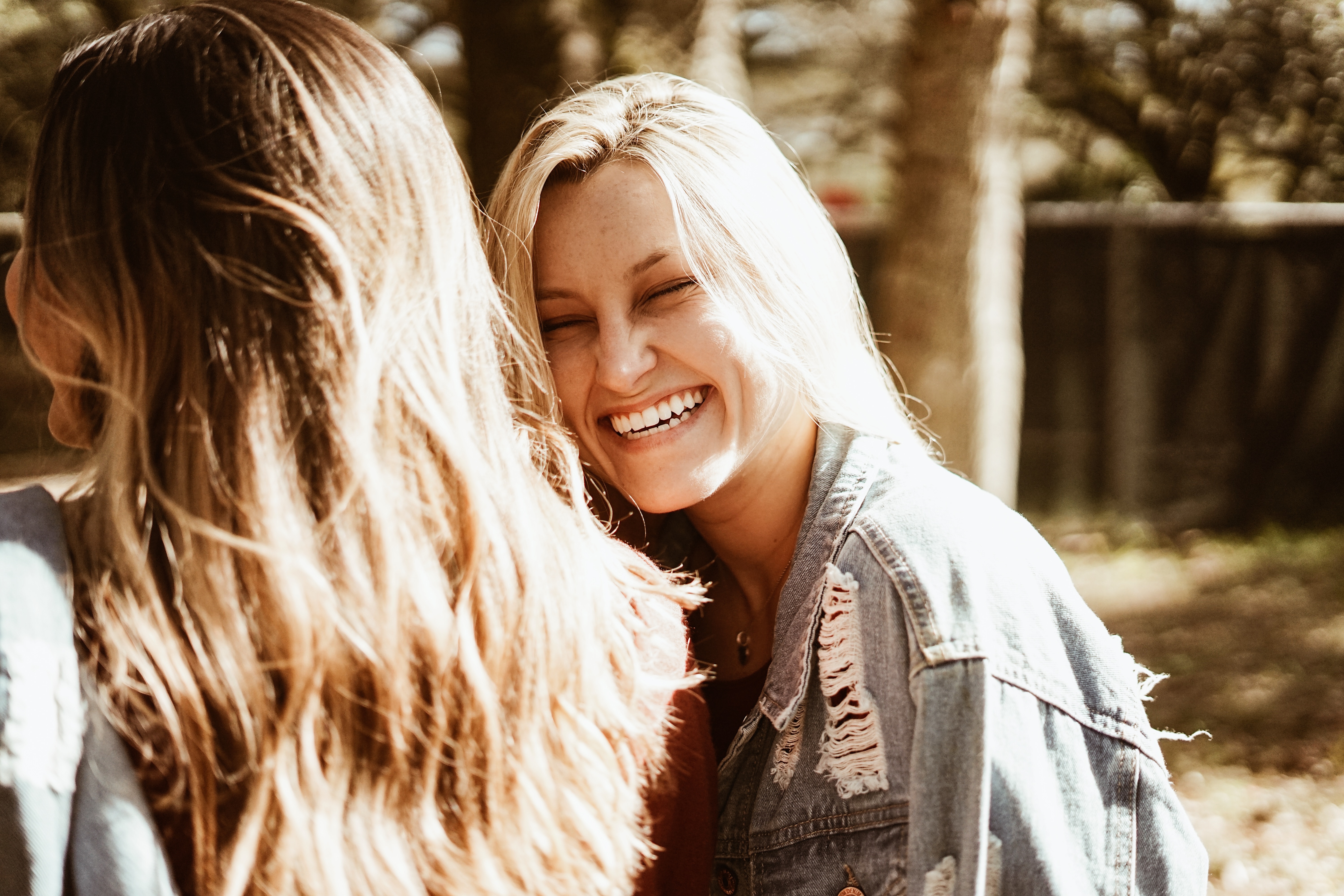 woman laughing with friends