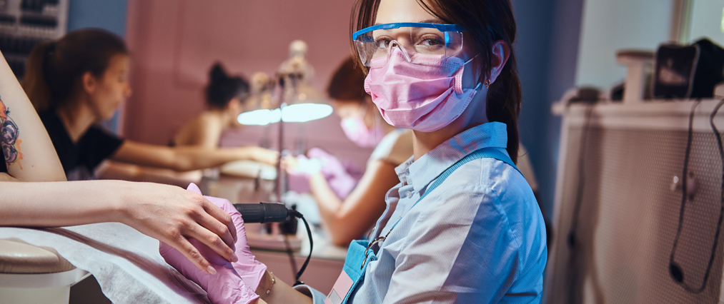 woman getting nails done featured
