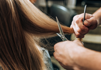 cutting woman hair