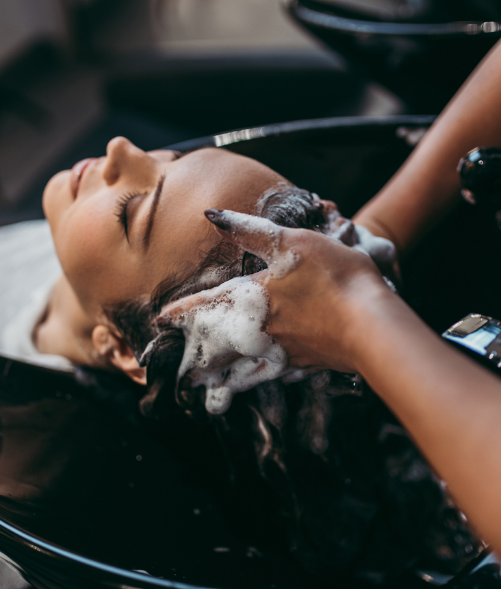 washing hair at a salon