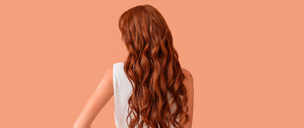 red styled hair featured