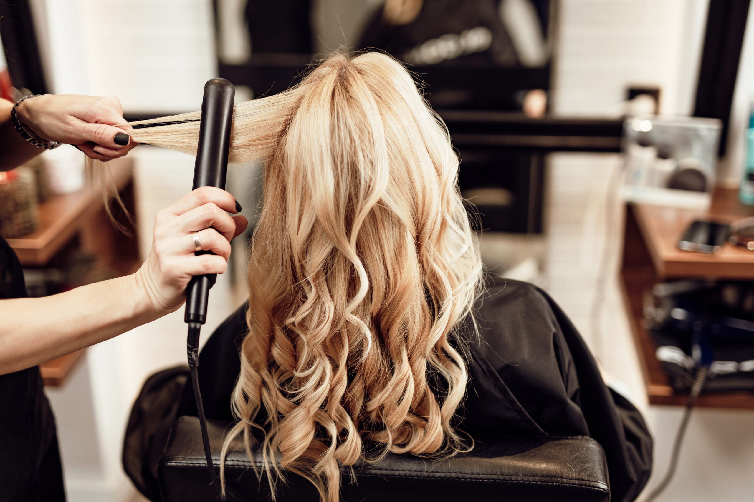 styling hair with curler