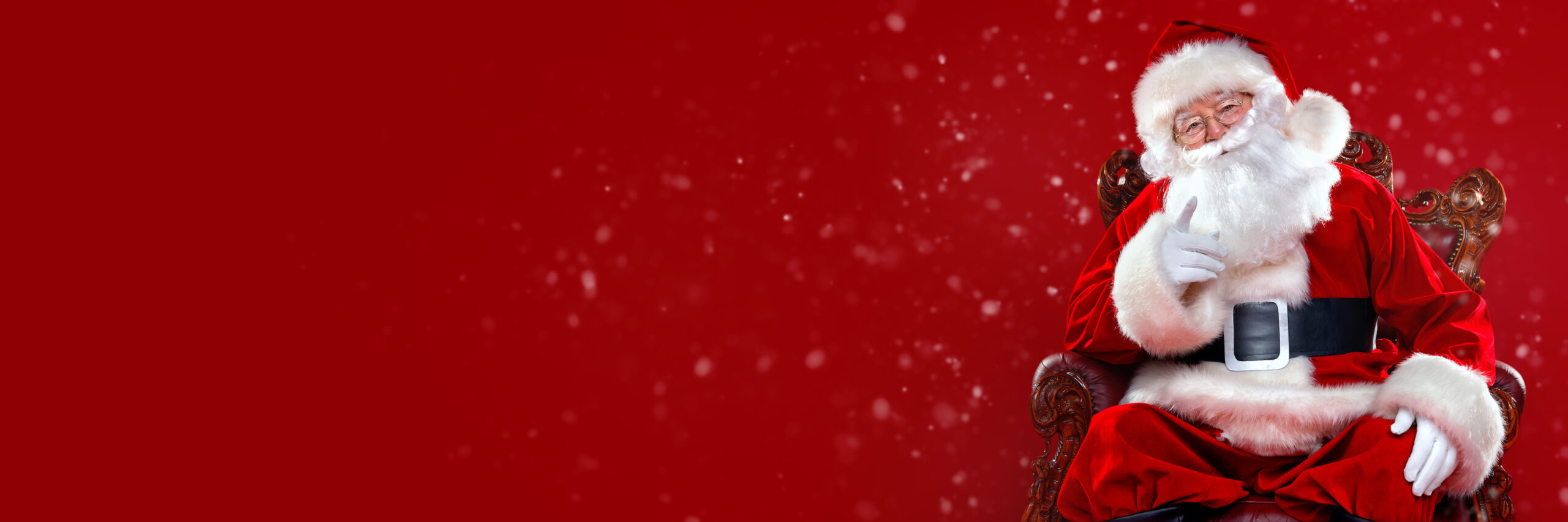 santa posing and pointing