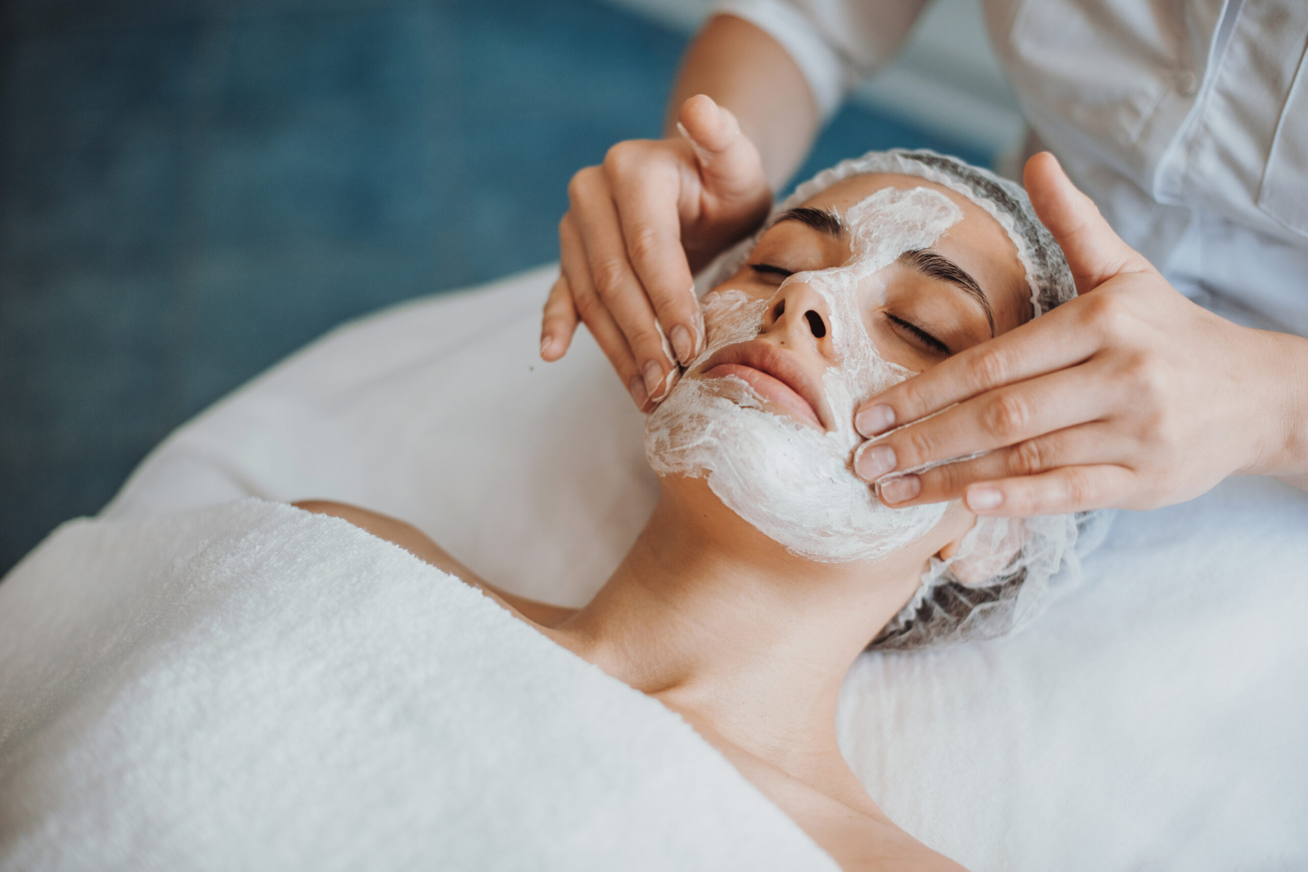 Woman with cream on her face